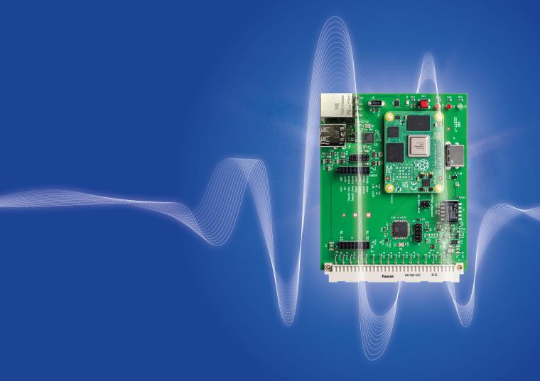 Eine grüne Leiterplatte (Platine) mit zahlreichen elektronischen Bauteilen ist...